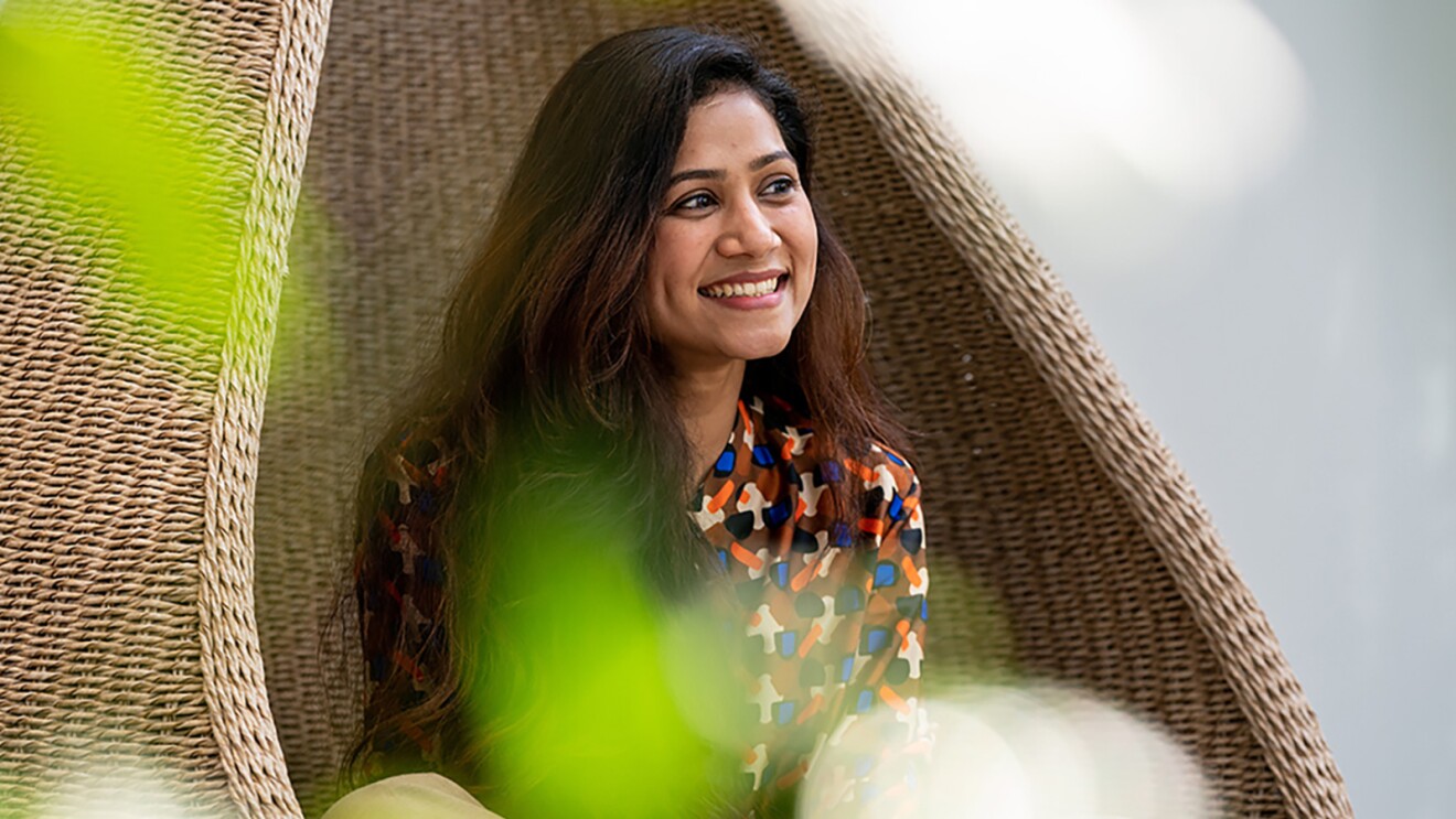 An image of a woman smiling. 