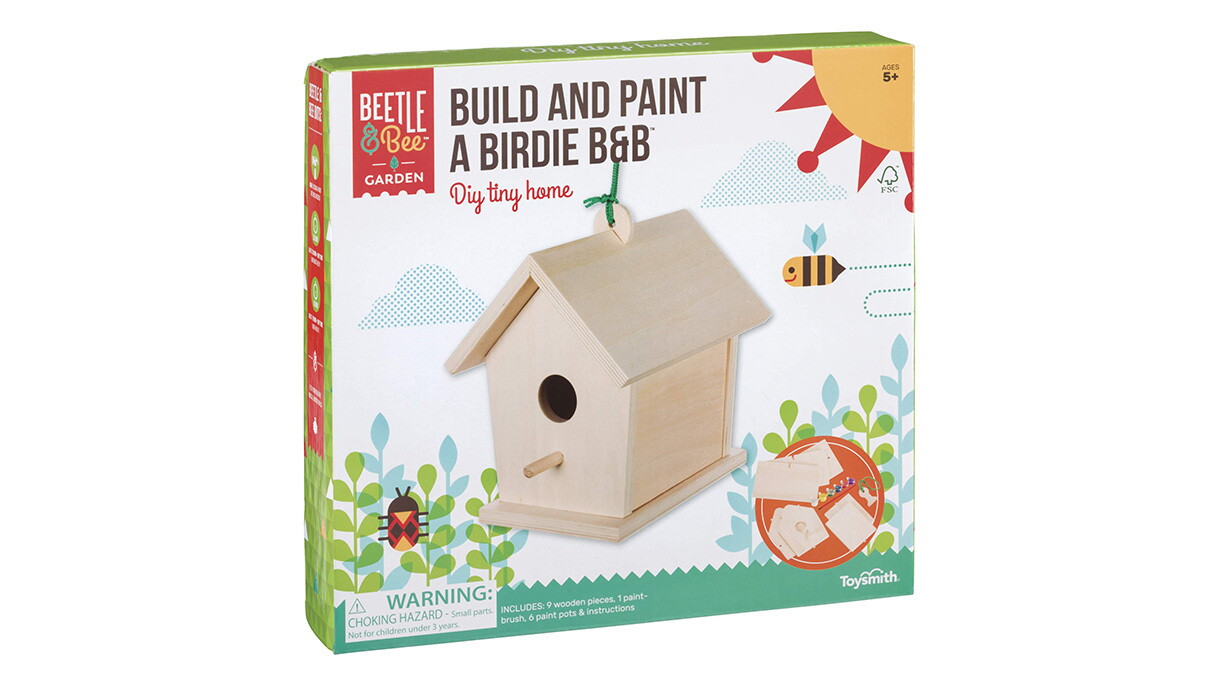 An image of a box with a wooden bird house on it and product labeling