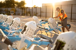 A fleet of Amazon drones ready for autonomous delivery operations.