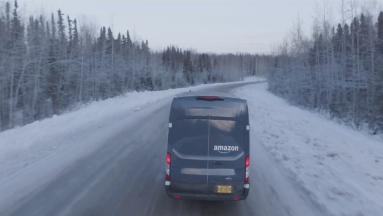 Amazon branded vans driving in Alaska