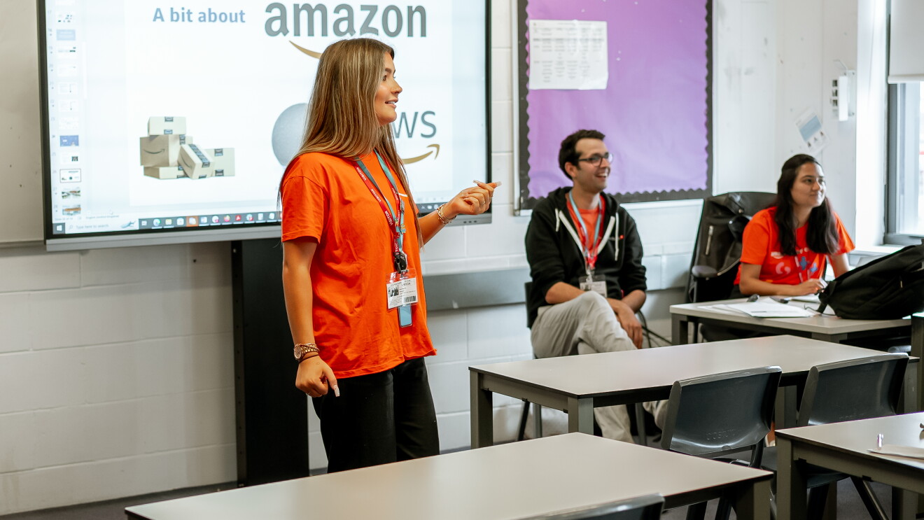 An Amazon volunteer gives a Class Chat at Ark Globe Academy in July 2023