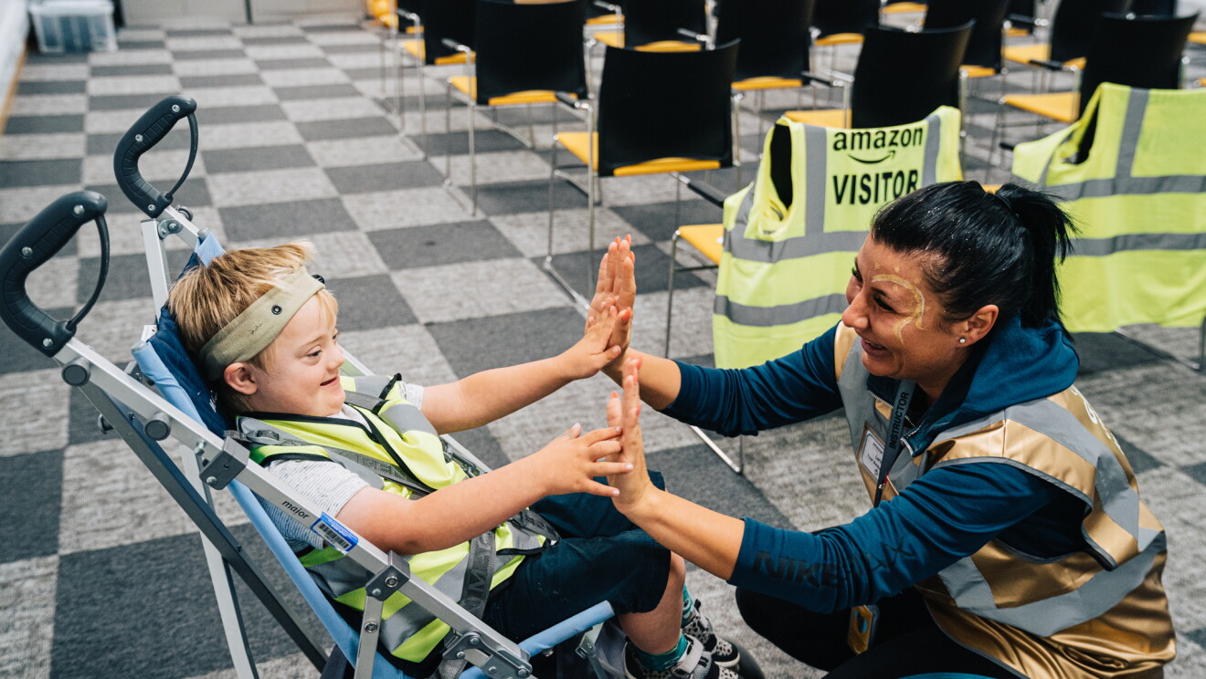Amazon staff and children at Doncaster fulfilment centre 
