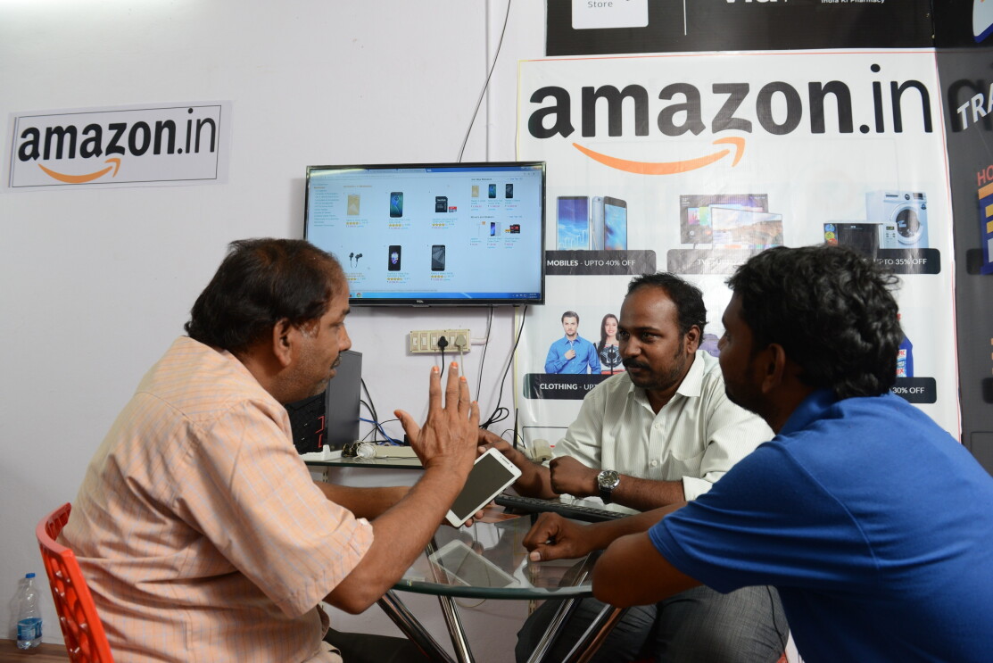 An Udaan point with a customer