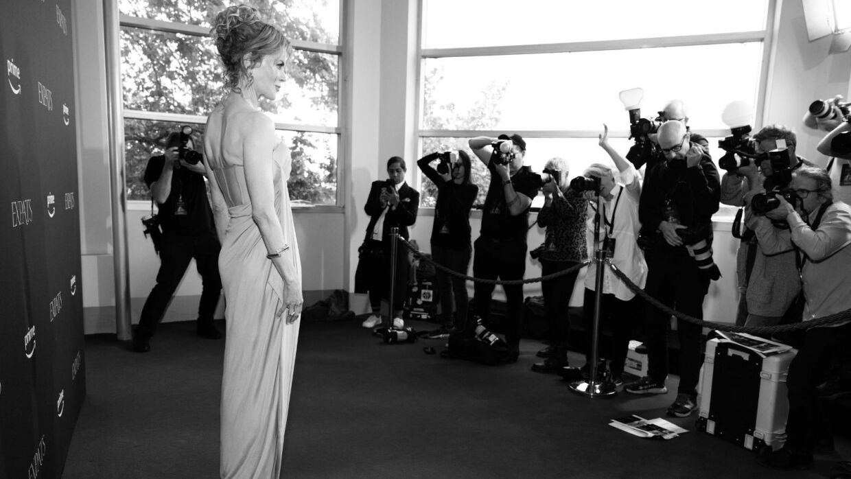 Nicole Kidman being captured on the red carpet by photographers at the Sydney preview screening of Expats.