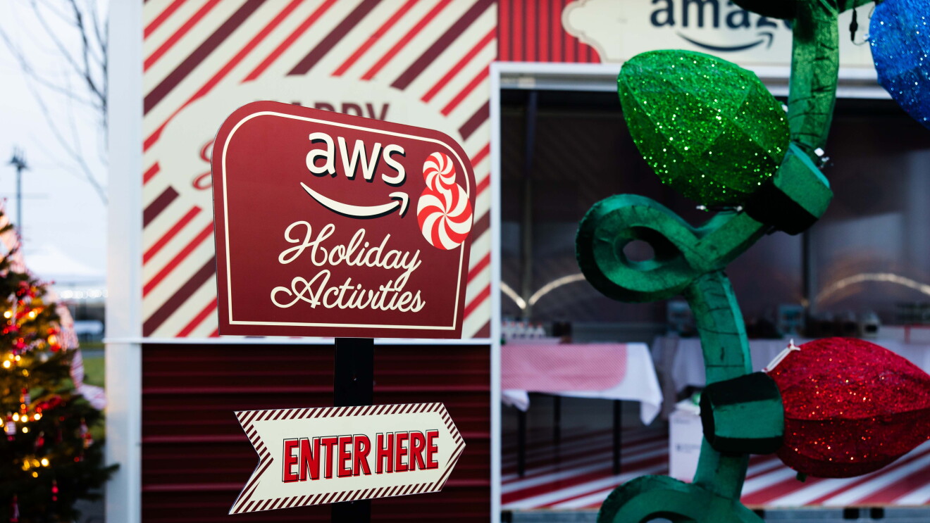 AWS in Communities: christmas themed sign that says 'AWS: holiday activities'