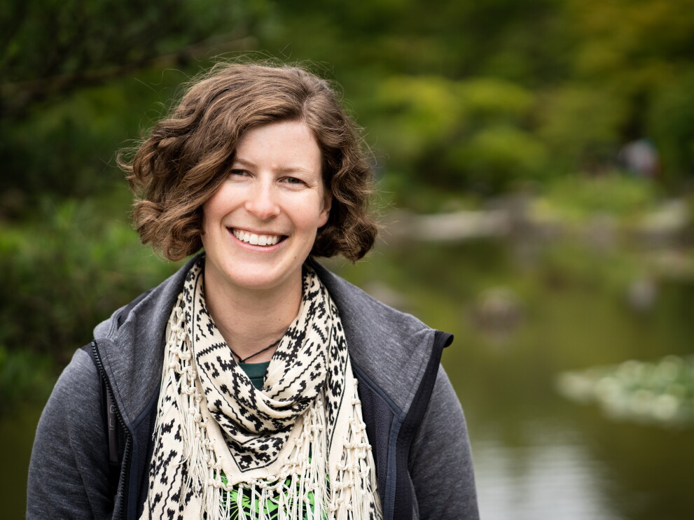 Kate Koehn head shot against green background