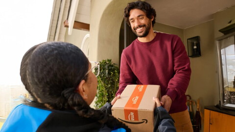 person handing person package