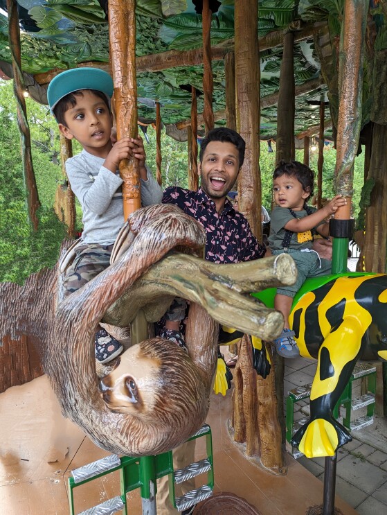 Sushant and Children on Merry-go-round