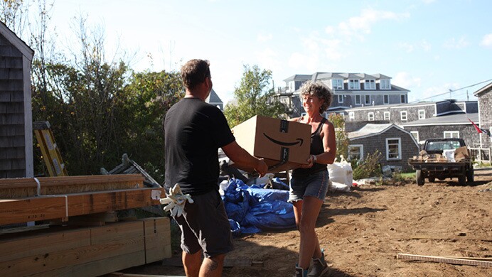 Amazon packages travel by boat, vehicle, and are delivered directly to customers.