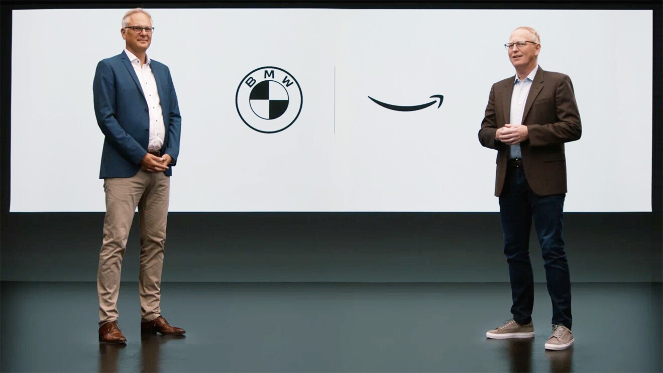 An image of leaders from Amazon and BMW presenting.