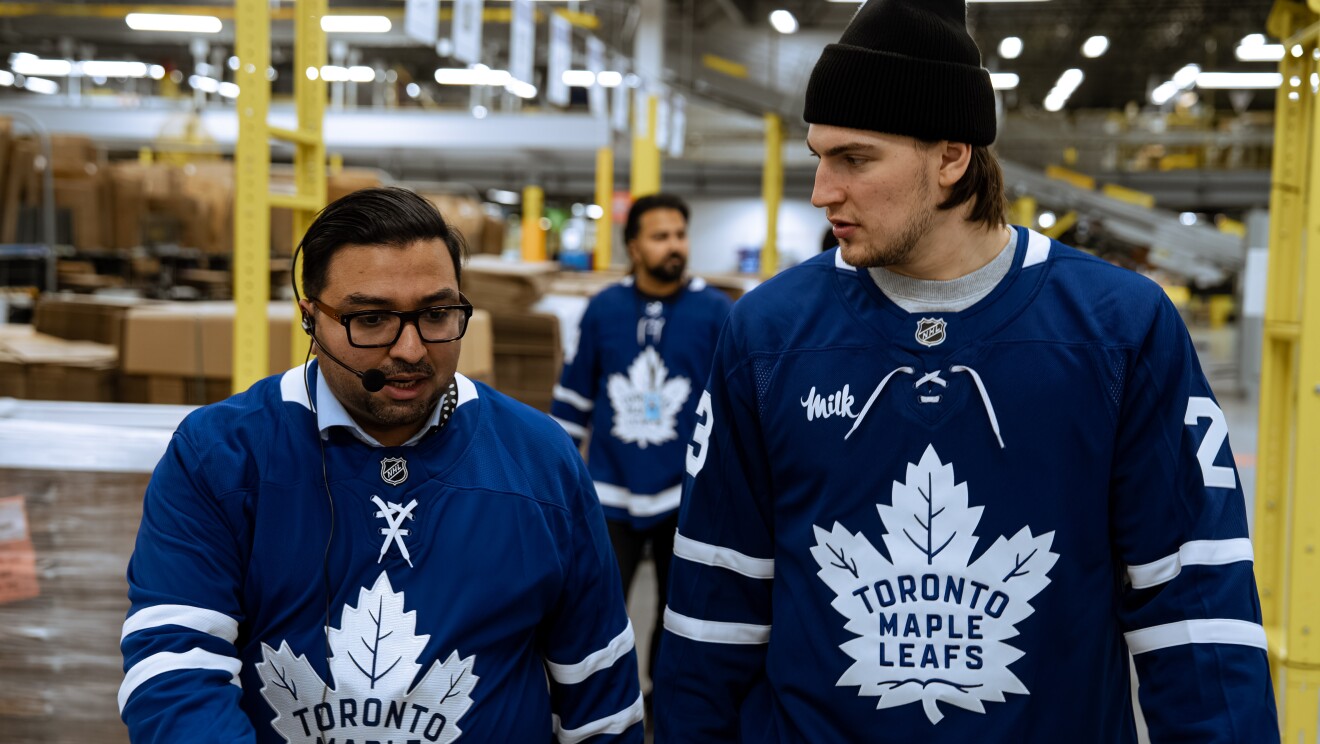 Toronto Maple Leafs hockey player packing boxes 