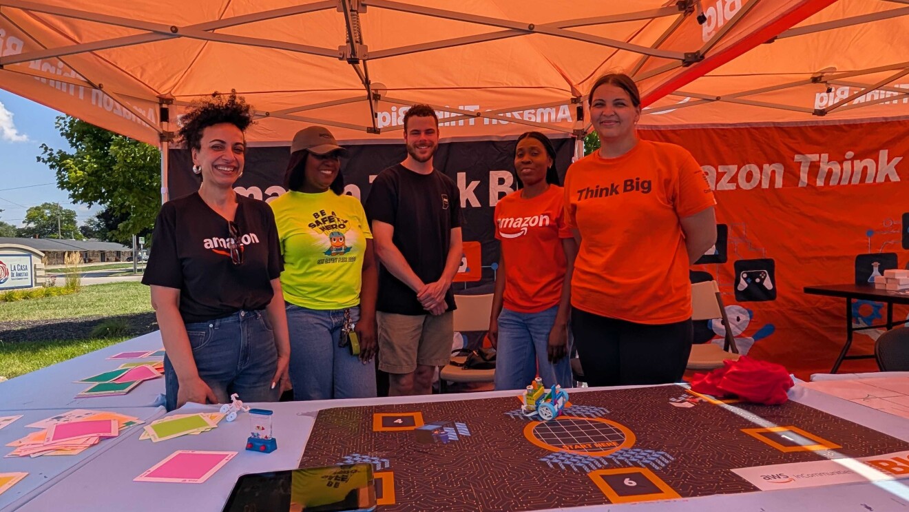 Amazon Think Big booth with staff at community event; South Bend, Indiana