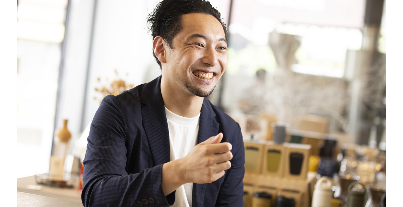 楽しそうに語る井田さんの写真