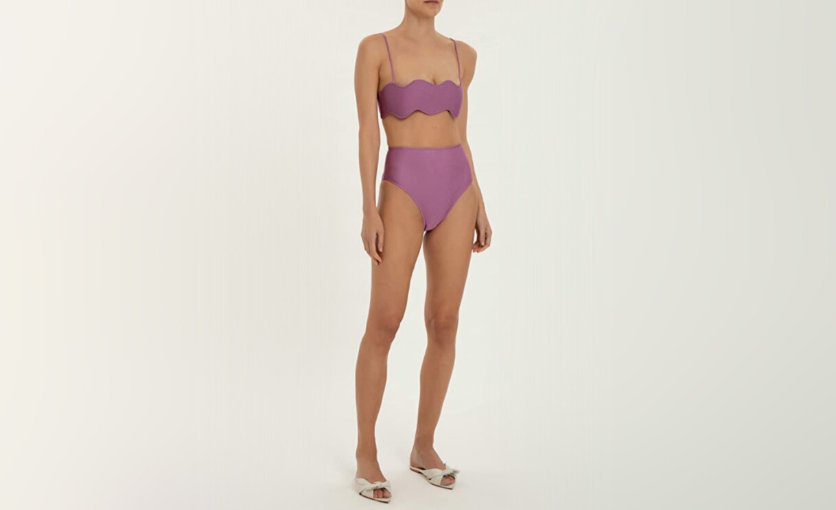An image of a model wearing an Adriana Degreas bathing suit.