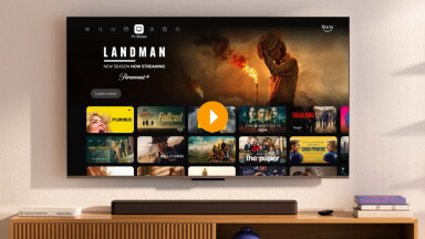 New Fire TV UI Horizontal Scroll on Amazon Fire TV Omni QLED Series - Lifestyle Setting