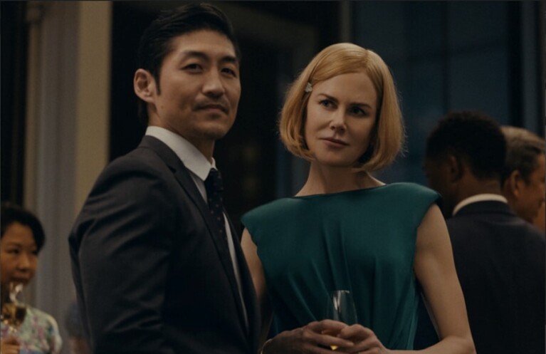 Nicole Kidman looks at her husband Brian Tee 