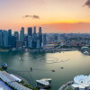 An image of Singapore's central business district at sunset