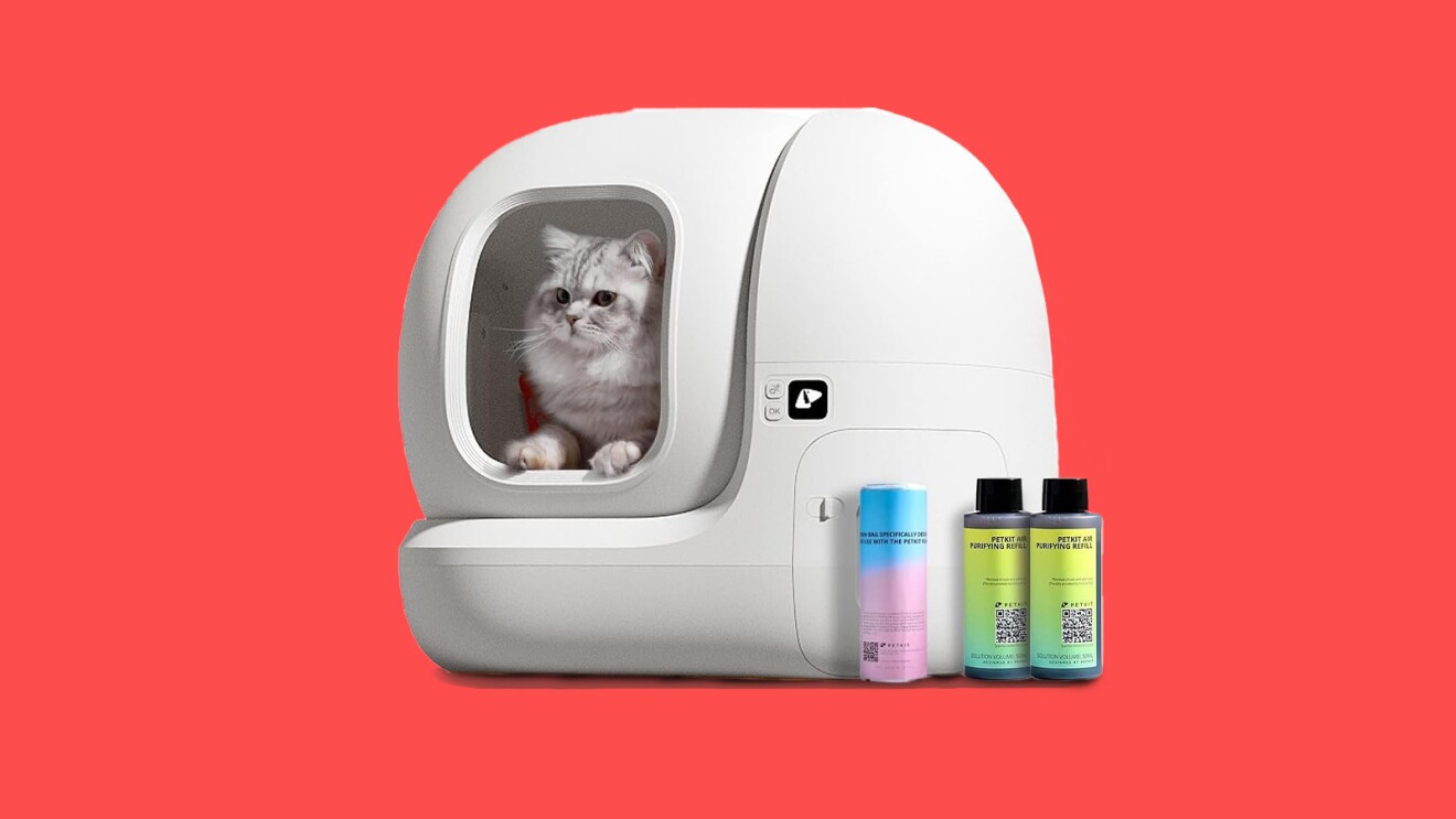 An image of a self-cleaning litter box with a cat inside.