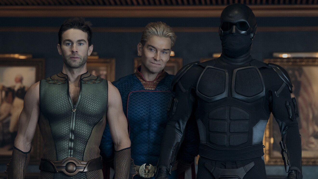  The Boys: Three superhero characters in futuristic costumes standing together