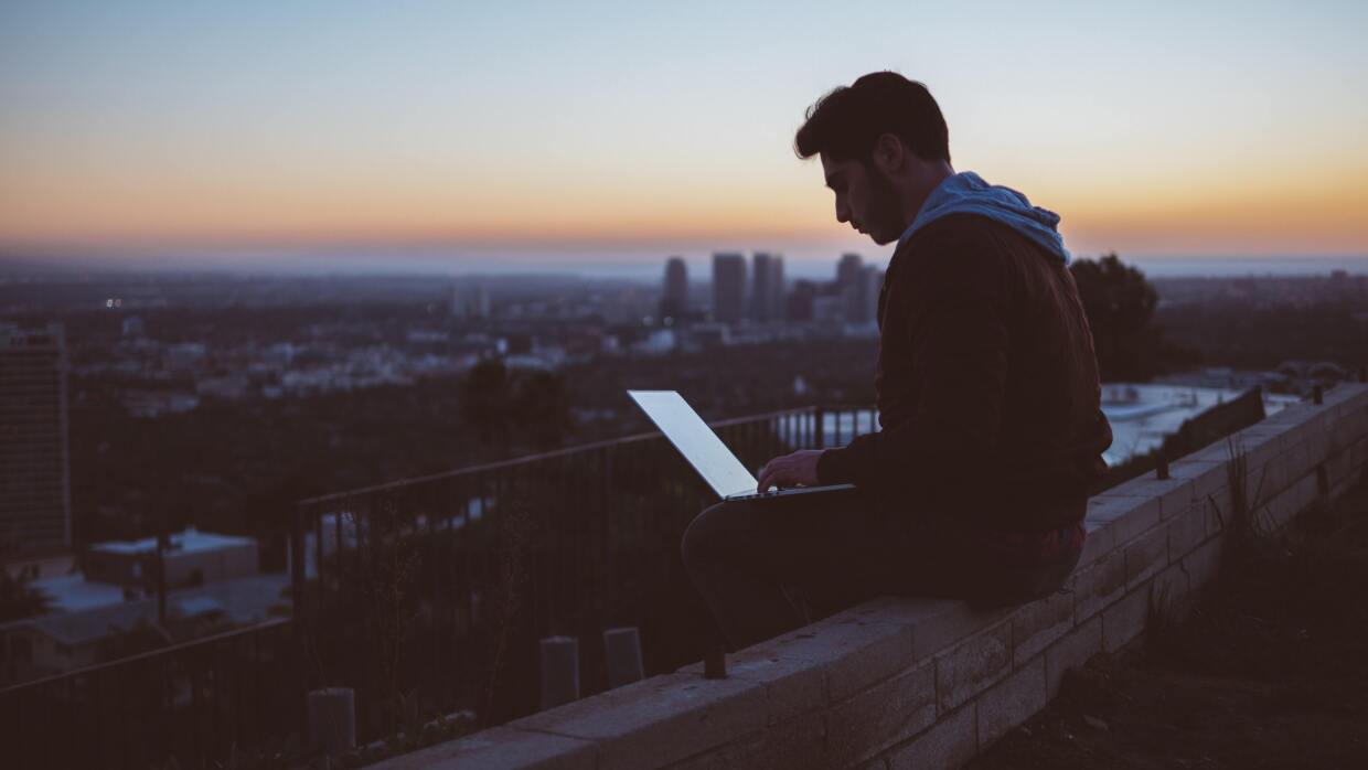 Man with Laptop image