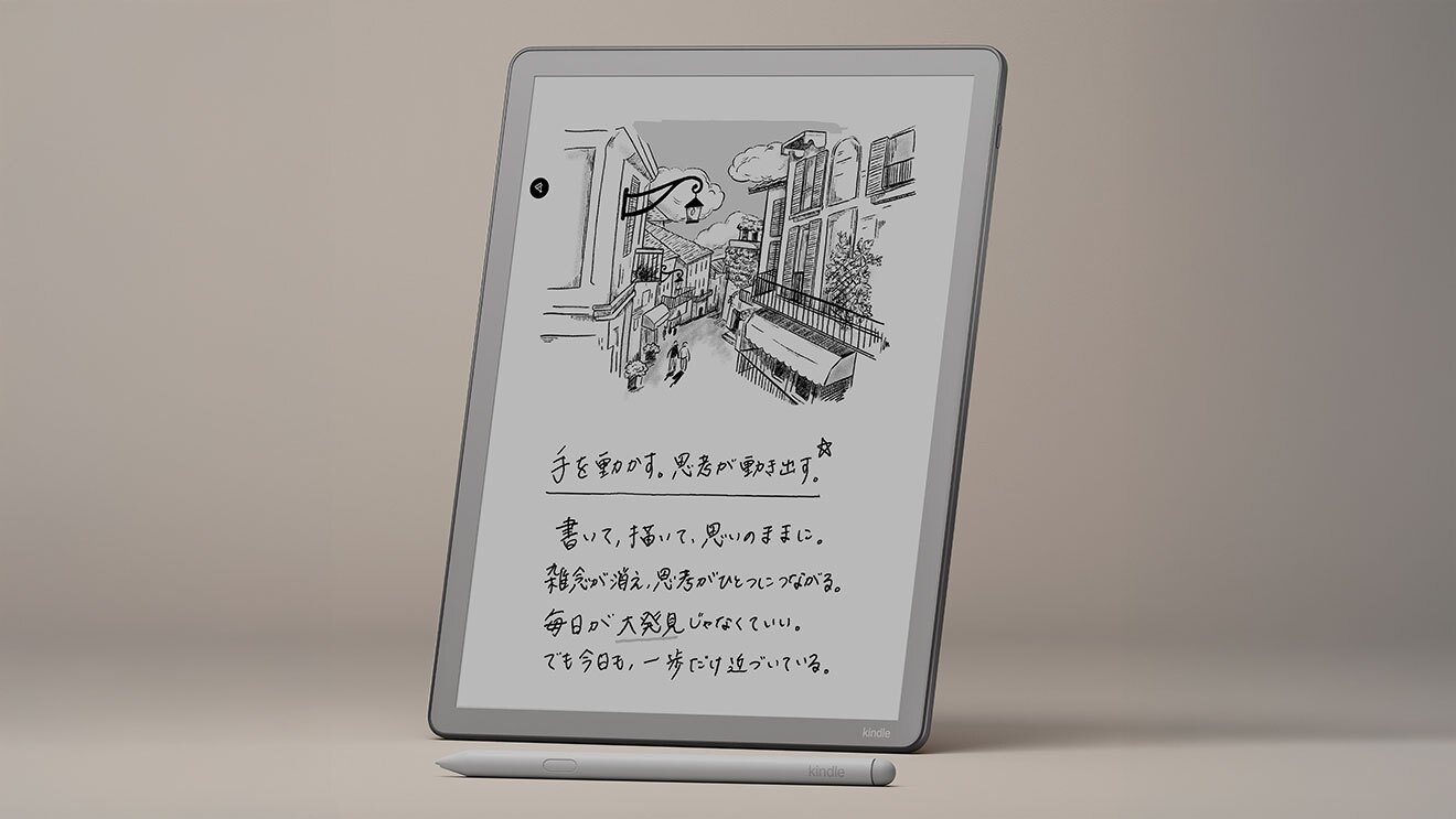 フレームが薄いグレーのタブレット端末。画面にはモノクロイラストと手書き文字が表示されている。製品手前に同色のペン。