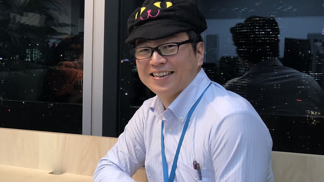 Noboru Obata, a Senior Account Manager on the Amazon Prime team and Co-Chair of the PwD Japan affinity group, smiles for a photo.