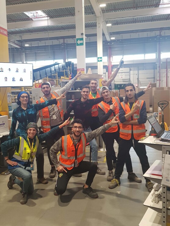 Amazon associates in our Milan fulfillment center participate in a 70s theme
