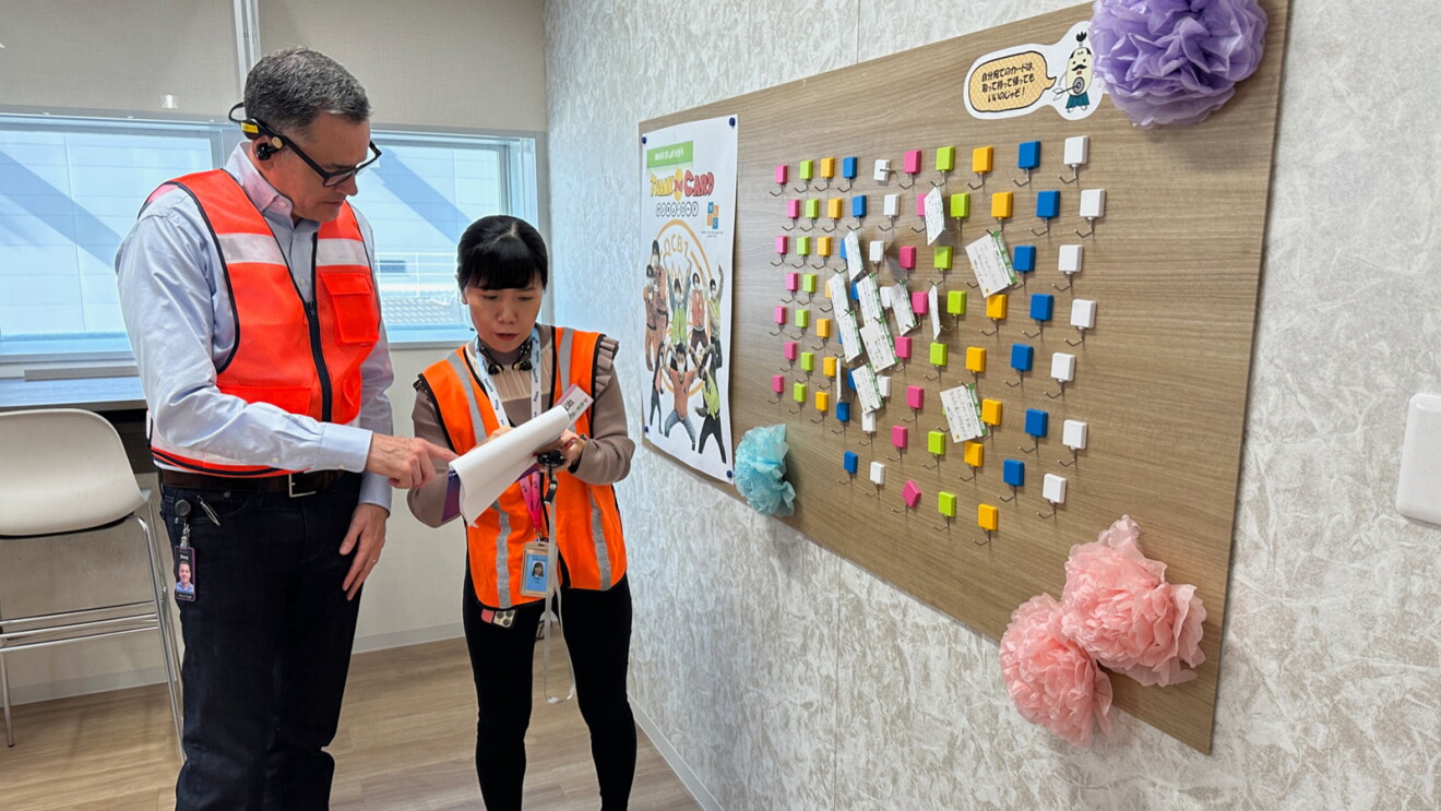 An image of Amazon Stores CEO, Doug Herrington, visiting Amazon employees in Japan.