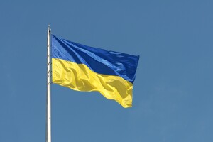 Flag of Ukraine against a blue sky