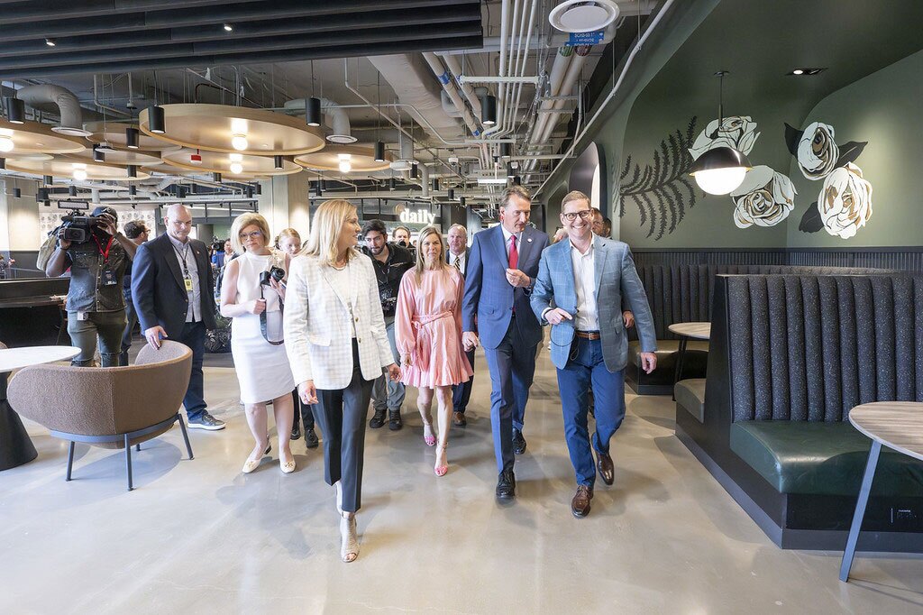 A group of people walk through Amazon's HQ2 in Arlington.