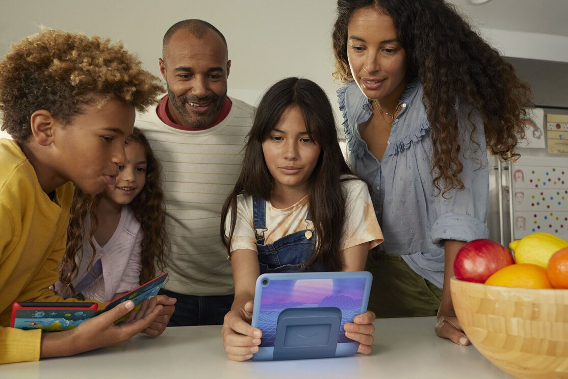 An image of a child using Amazon's Kids Fire Tablet in their home.