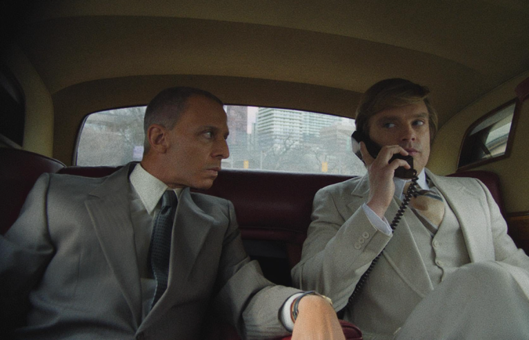 Sebastian Stan as Donald Trump and Jeremy Strong as Roy Cohn in The Apprentice