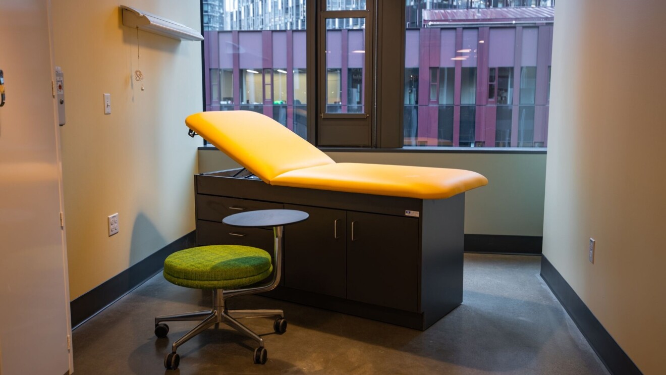 An image of a room with a reclined chair and a small stool where Mary's Place guests can receive medical care from on-staff nurses and medical professionals volunteering their time.