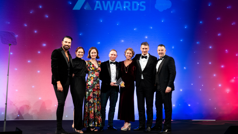 Amazon employees with host Rylan Clark collecting their awards at the Retail Week Awards 2024