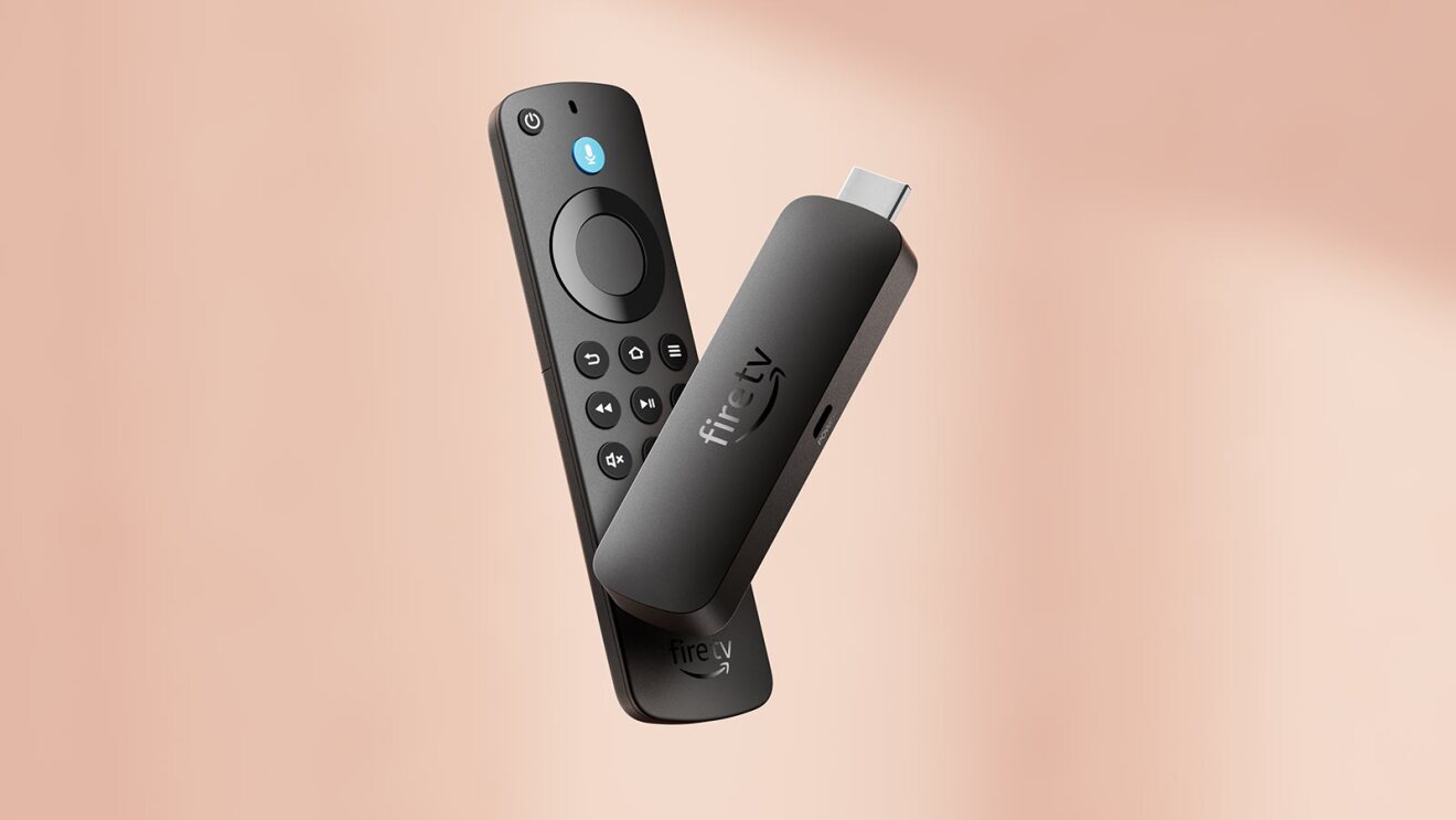 Amazon Fire TV Stick and remote control on peach background
