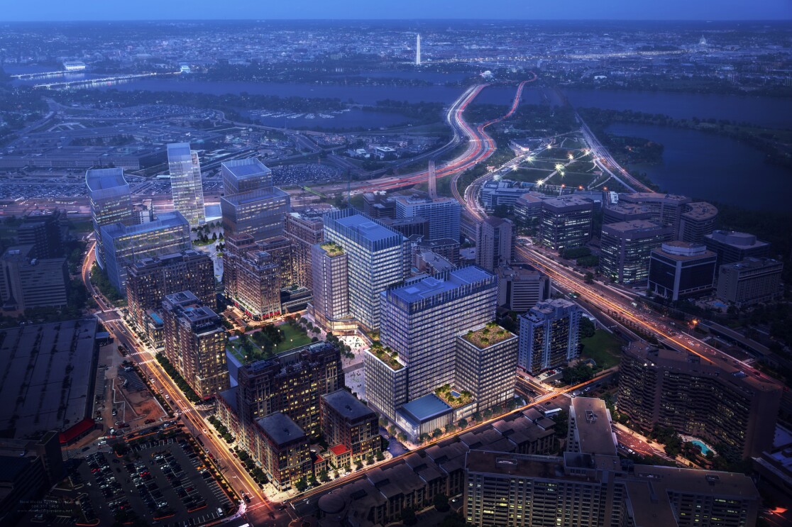 Nighttime aerial view of office towers in a corporate campus.