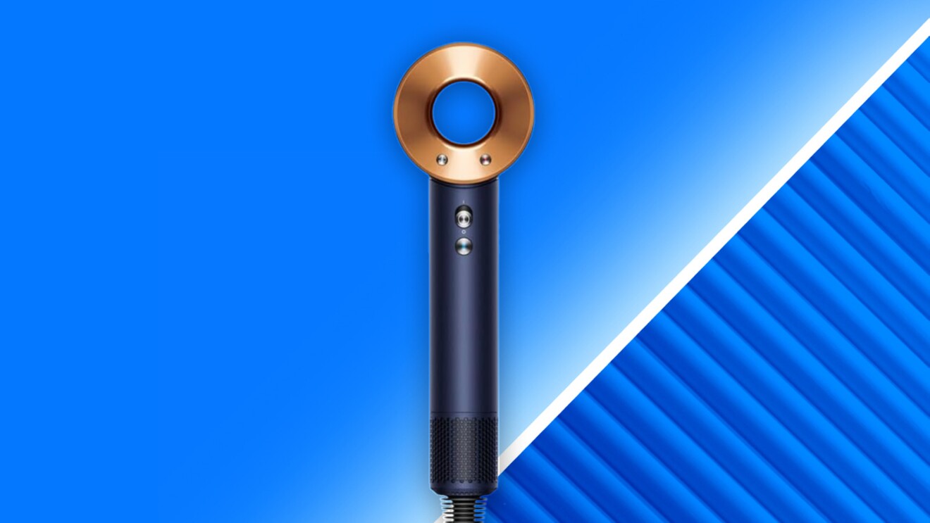 Dyson Supersonic hair dryer on blue geometric background
