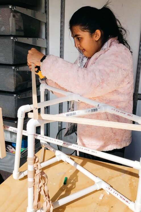 A student participates in The Tech Interactive's annual Tech Challenge.