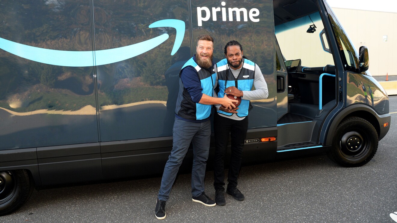 Football players Richard Sherman and Ryan Fitzpatrick driving Amazon’s electric delivery vans and delivering packages.