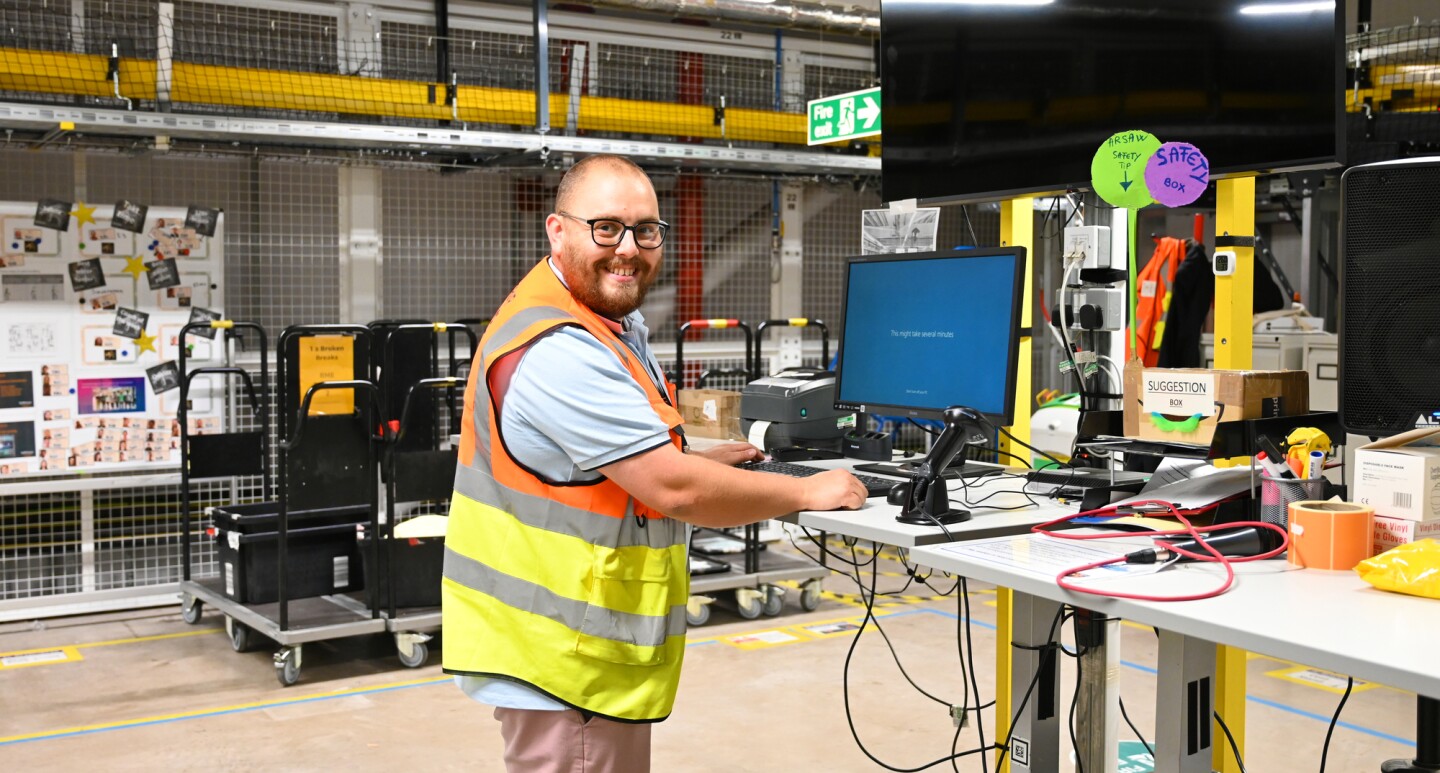 Peter Keay - Area Manager at BRS1 standing at his desk