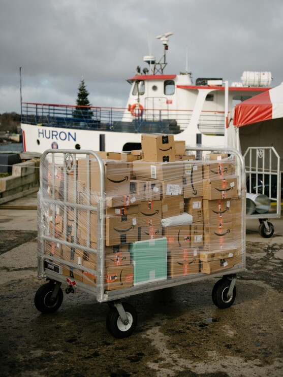 Amazon packages are ready to be loaded on to the Mackinac ferry.