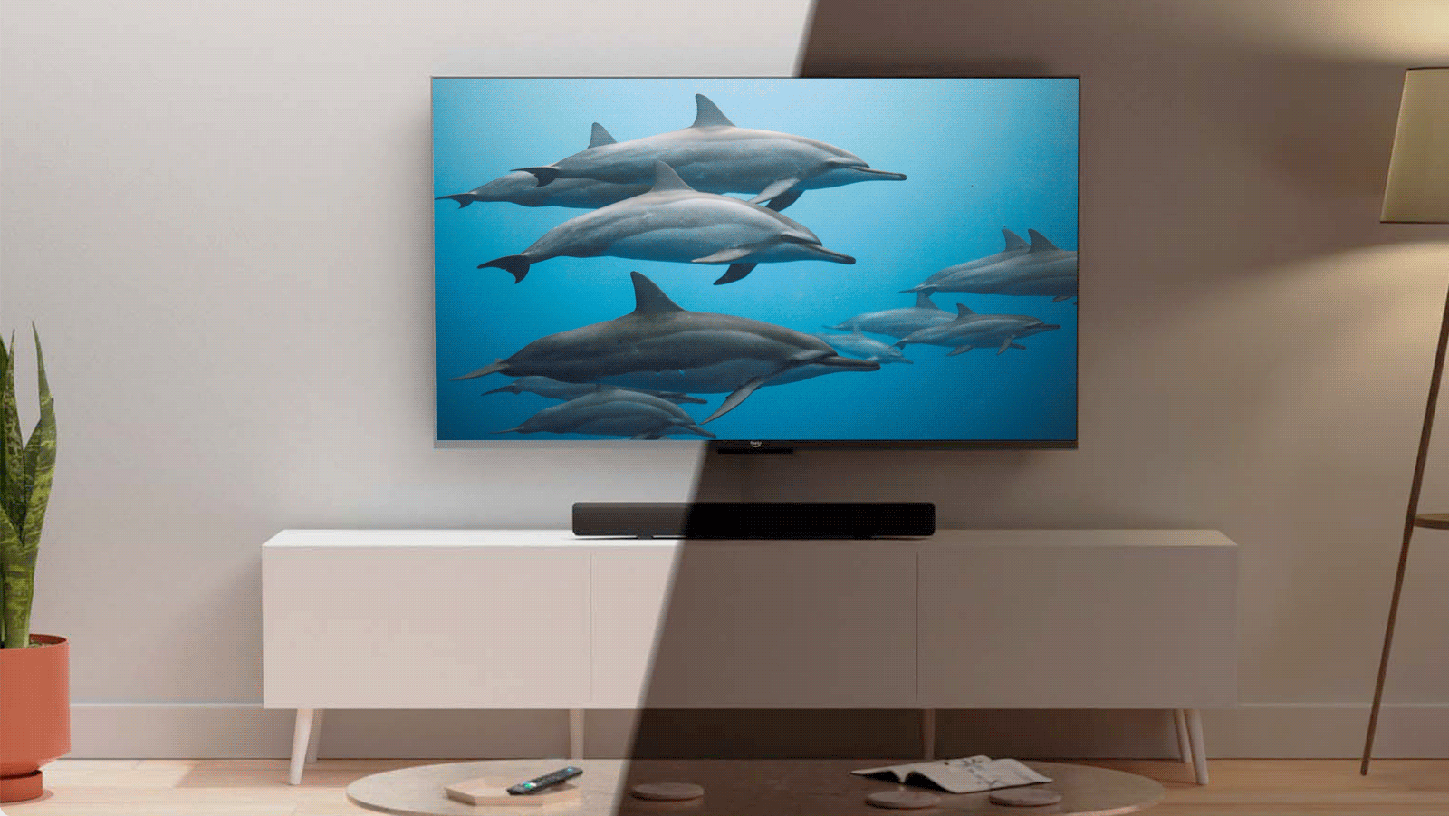 An animated image of a Fire TV showing a moving image of dolphins swimming in the sea.