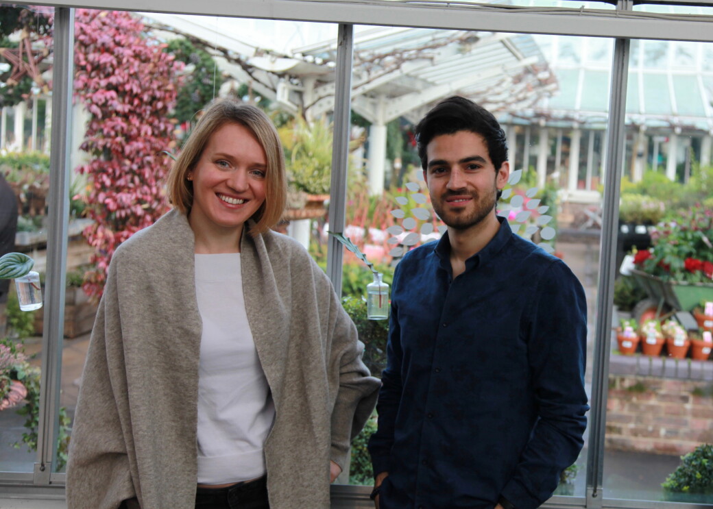 Nuki Health Co founders stood in front of floral background