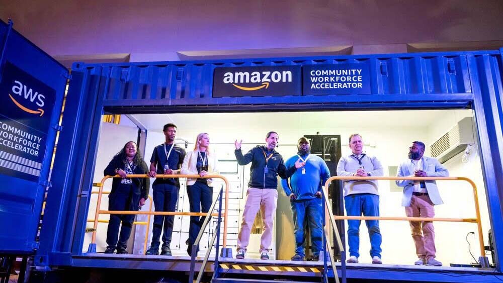 AWS community workforce accelerator with individuals standing and speaking
