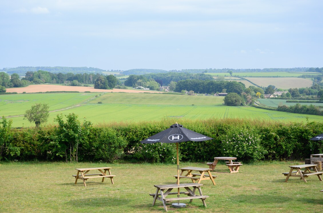 The beer garden at The Farmer's Dog in Burford, Jeremy Clarkson's proper British pub from Clarkson's Farm season 4