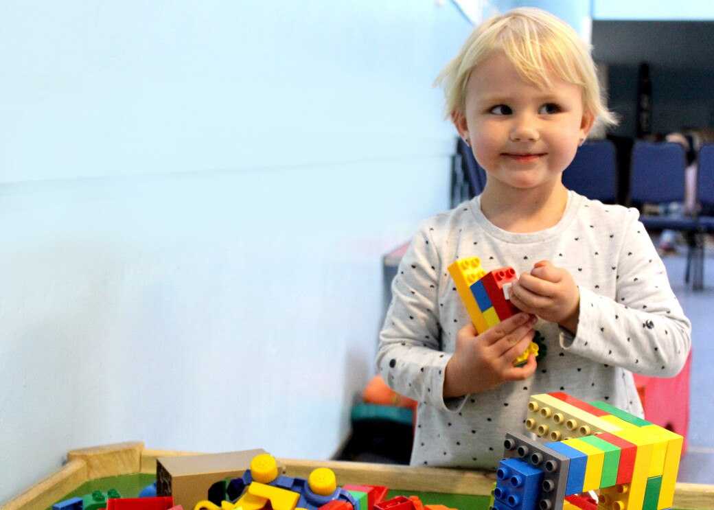 In Kind Direct charity image of child playing with lego