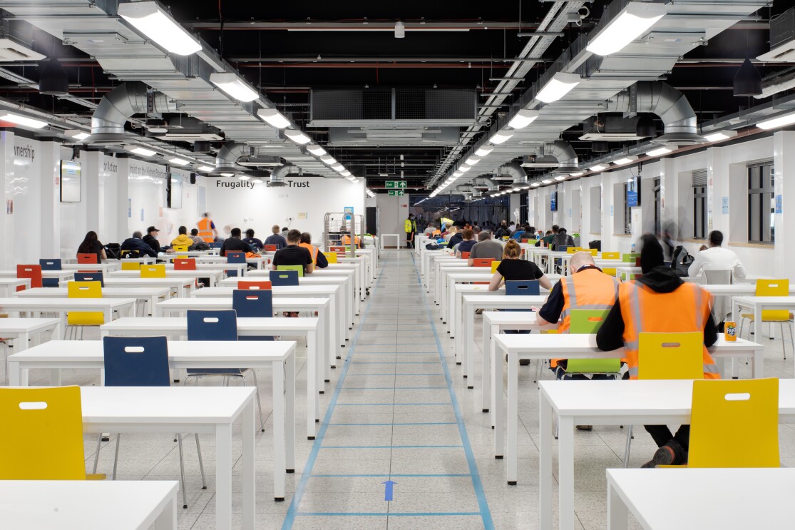 Amazon employees sat socially distanced 