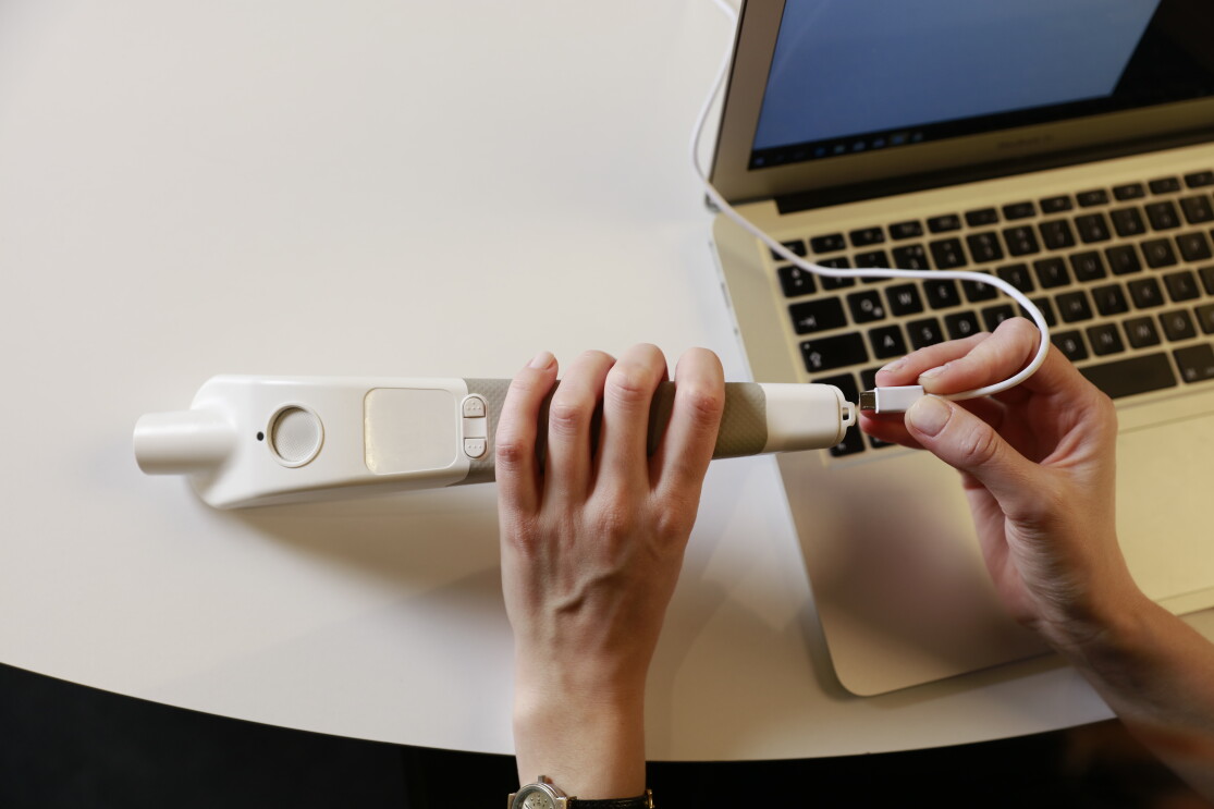 charging the wewalk smart cane handle with a laptop