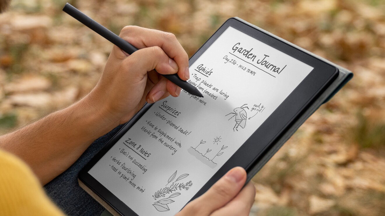 An image of a hand writing on the Kindle Scribe.