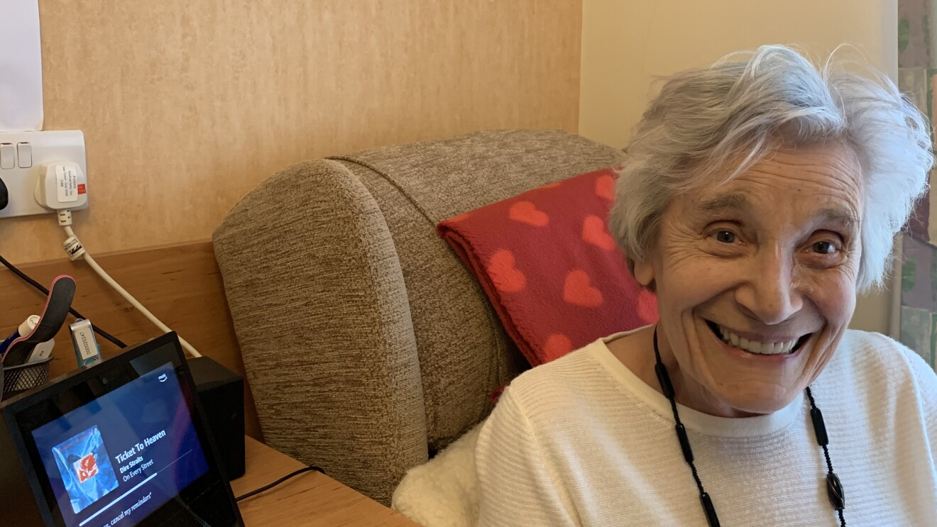 Ruth, one of the residents of Hampton Care home, near her Echo Show device